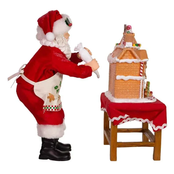 Kurt Adler 10.5-Inch Battery-Operated Fabriche Santa Decorating Led Gingerbread House Table Piece