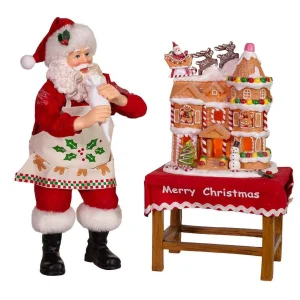Kurt Adler 10.5-Inch Battery-Operated Fabriche Santa Decorating Led Gingerbread House Table Piece