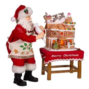 Kurt Adler 10.5-Inch Battery-Operated Fabriche Santa Decorating Led Gingerbread House Table Piece